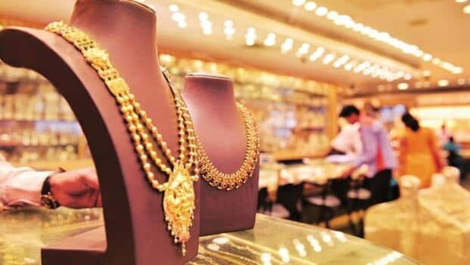 Gold prices rise ahead of US inflation data, silver slips 0.3%